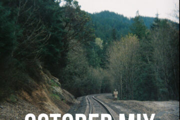 october cover art photograph tress train tracks
