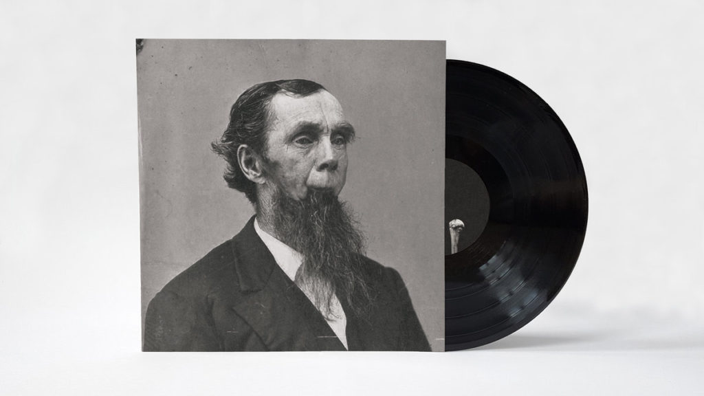 photo of william ryan fritch behind the pale LP record