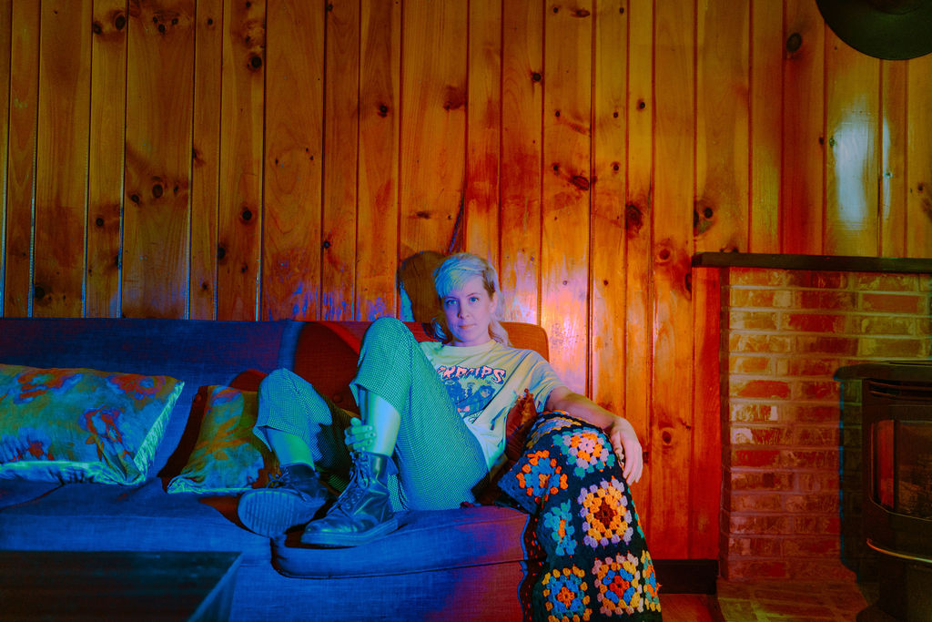 photo of Diane Jean of Clever Girls sitting on a sofa