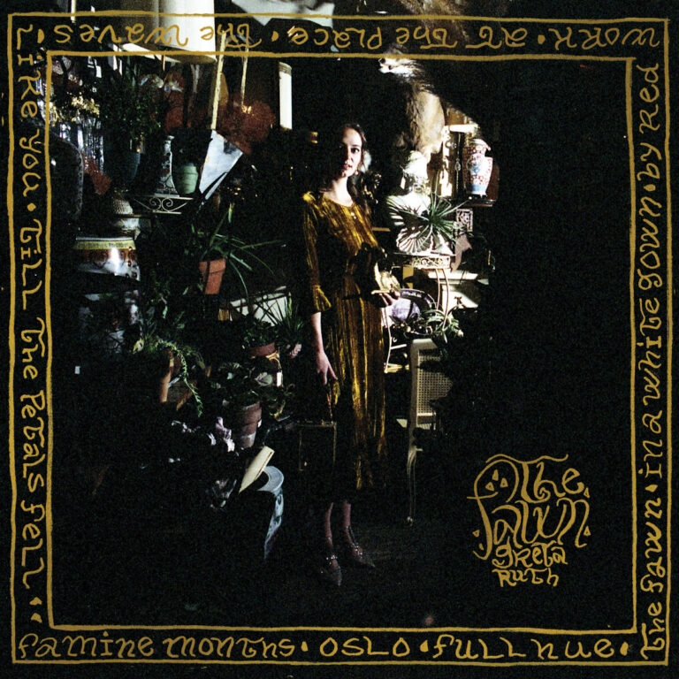 Album art for The Fawn by Greta Ruth - dimly lit photo of woman in a gold dress