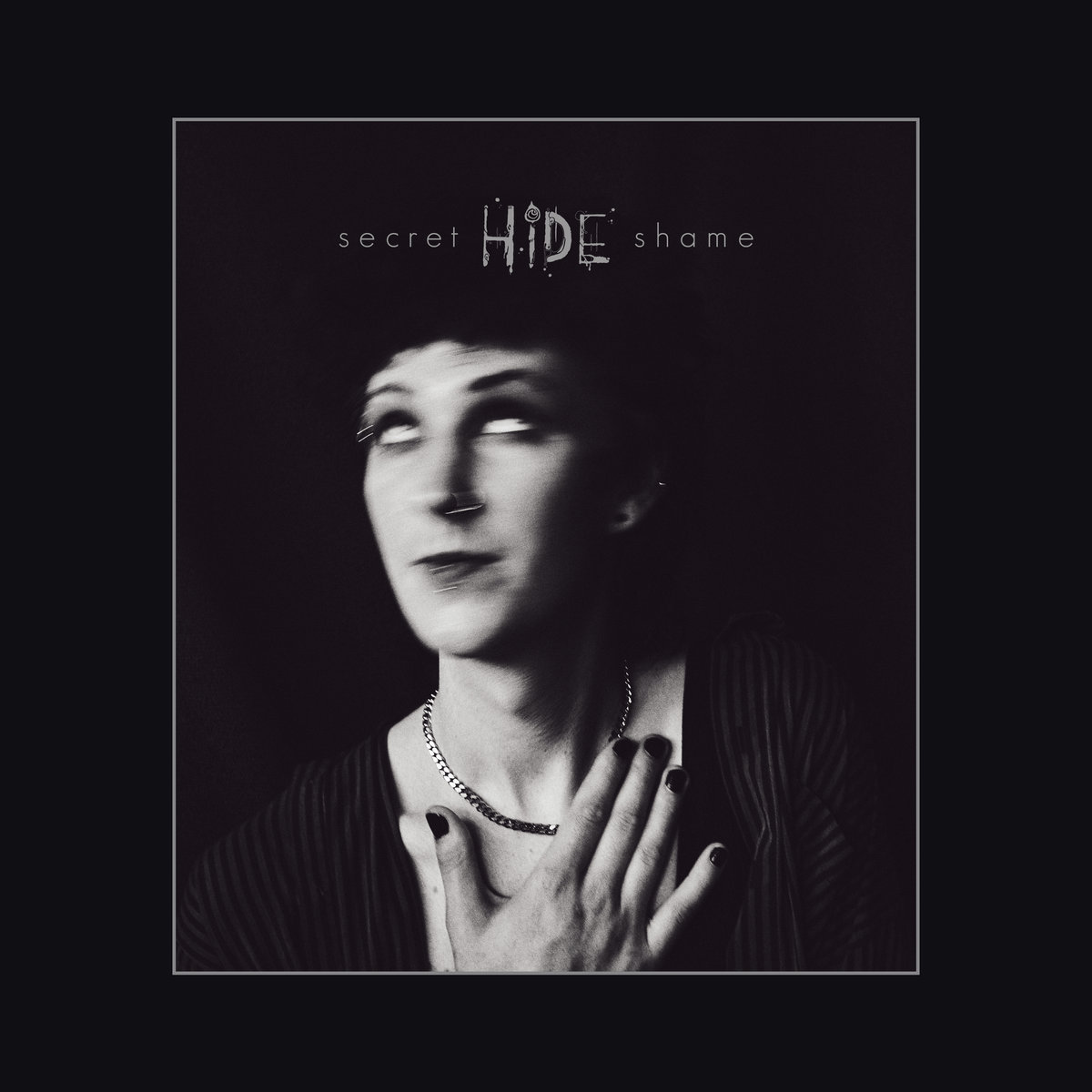 secret shame hide single cover - black and white portrait photo of a person