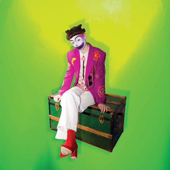 nora kelly band rodeo clown album art - a photo of a clown sitting on a green trunk